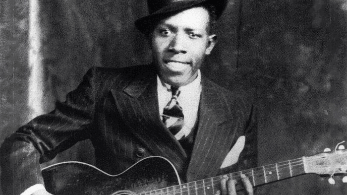 Robert Johnson y su guitarra