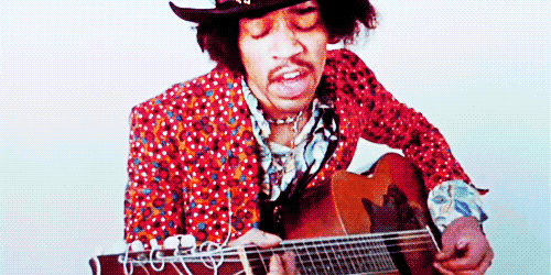 Jimmy Hendrix tocando la guitarra.