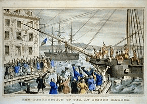 Two ships in a harbor, one in the distance. On board, men stripped to the waist and wearing feathers in their hair throw crates of tea overboard. A large crowd, mostly men, stands on the dock, waving hats and cheering. A few people wave their hats from windows in a nearby building.