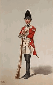 Portrait of a British soldier in red coat and fur busby posing formally “at rest” with a Brown Bess musket.