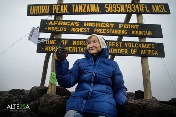 Angela Vorobeva on the top of volcano Kilimanjaro, 5895 meters