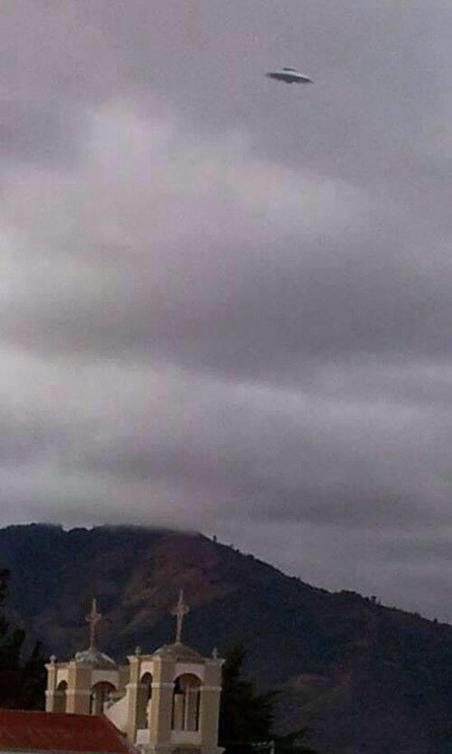 Flying Saucer above a church