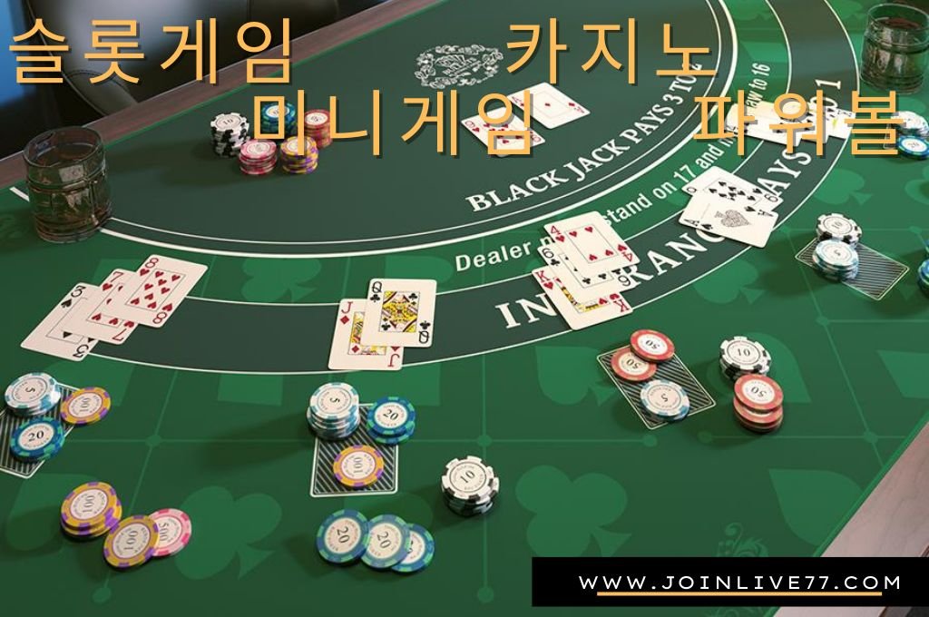Green blackjack table with cards and chips.