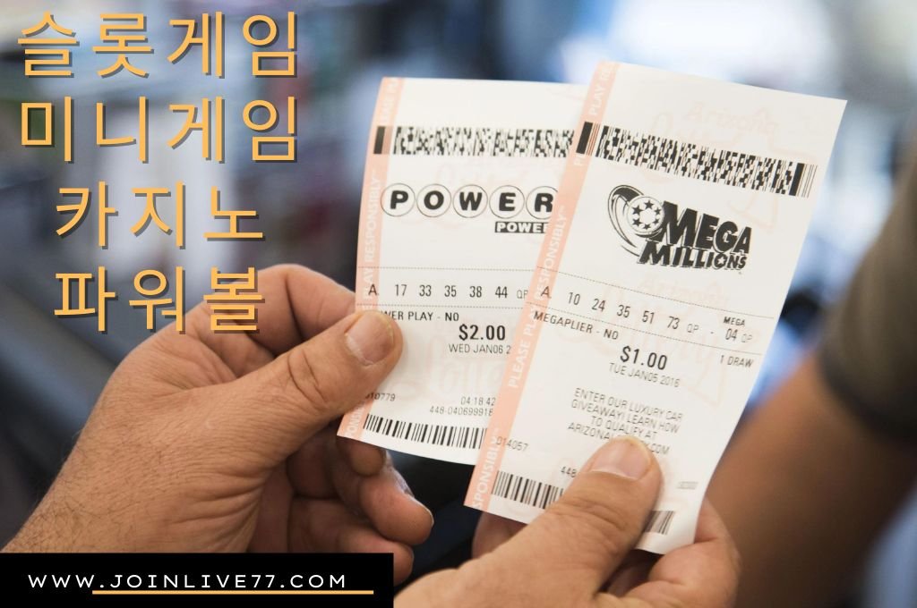 Hands holding two lottery tickets