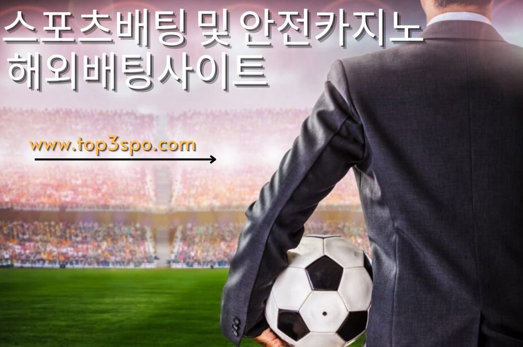  business man wearing a black suite kept his face turned away while holding soccer ball