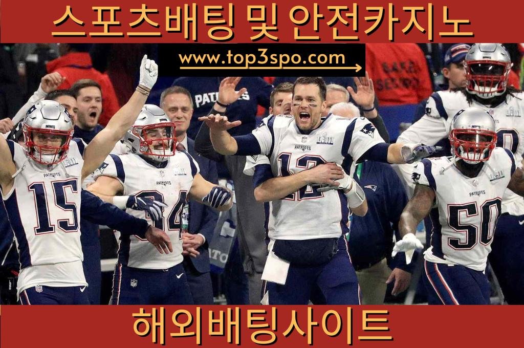 A champion Super bowl team celebrating their won at center of the field