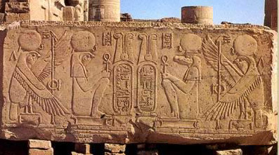 The two primary deities of Kom Ombo, Sobek right and Haroeris, left, face each other on a block of sandstone