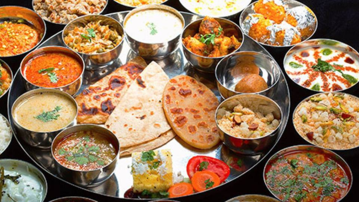 The Rajasthani Thali is a lavish spread showcasing the diverse flavours of Rajasthan's cuisine