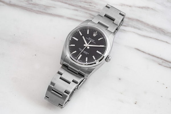 Replica Uhren Rolex Oyster Perpetual 34 & 39 weißes und schwarzes Zifferblatt